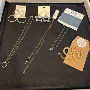 NEW 3 earrings costume jewelry and
3 necklaces New all have tags except one